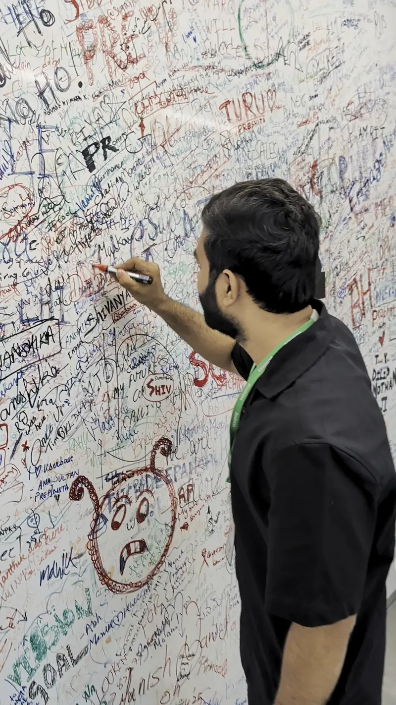 Signing the creators wall